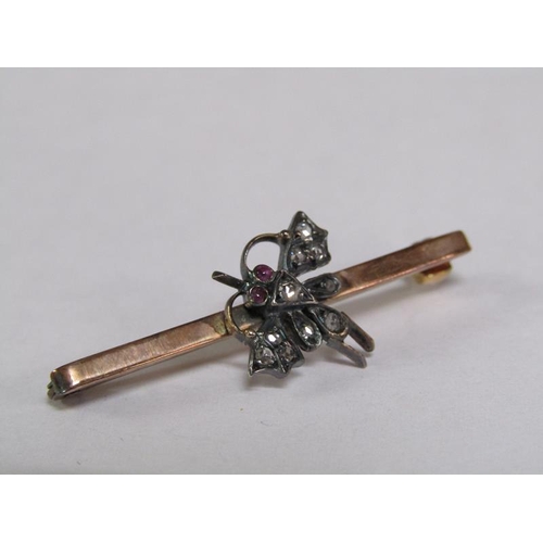 112 - A 9ct gold diamond set insect bar brooch, 2.6g.