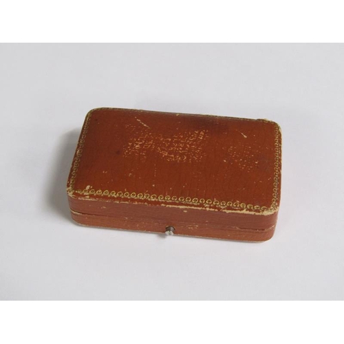 114 - A gold sapphire and diamond set crescent brooch, 5.25cm l.