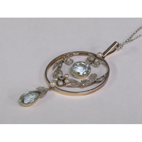 117 - An 18ct white gold Art Deco style diamond and aquamarine set pendant with chain, total 8.2g.