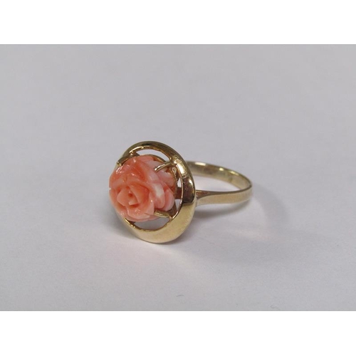 124 - A 14ct gold ring set with rose carved coral setting, size M 1/2, together with a 14ct gold chain wit... 