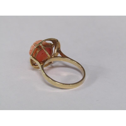 124 - A 14ct gold ring set with rose carved coral setting, size M 1/2, together with a 14ct gold chain wit... 