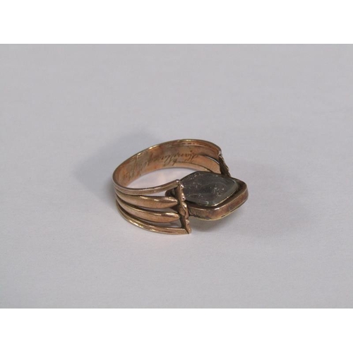126 - A gold memoriam ring with a twist memoriam and enamel setting, dated 1814, size P 1/2, total 4g.