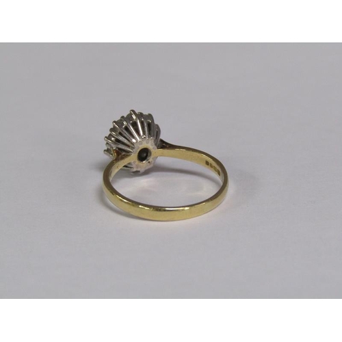 131 - An 18ct gold ruby and diamond set ring, size R.