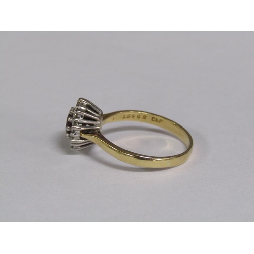 131 - An 18ct gold ruby and diamond set ring, size R.