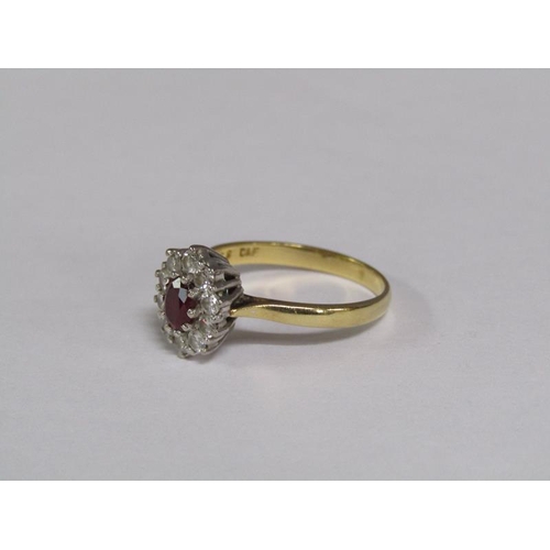 131 - An 18ct gold ruby and diamond set ring, size R.
