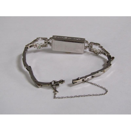 99 - An Art Deco platinum and diamond set ladies cocktail watch, 14.1g overall.