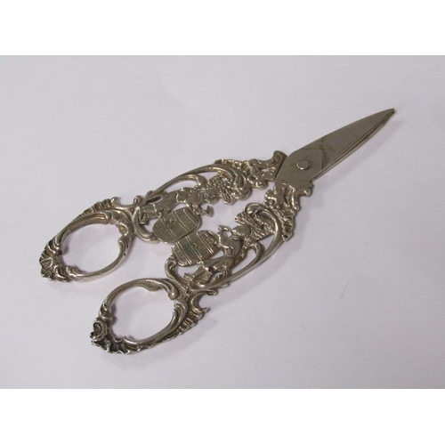 152 - A 19c German pair of silver scissors, cast with barrel makers, .800std, 12cm l.