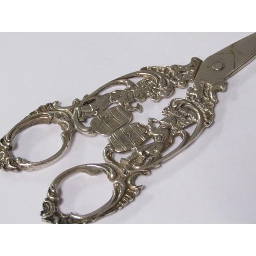 152 - A 19c German pair of silver scissors, cast with barrel makers, .800std, 12cm l.