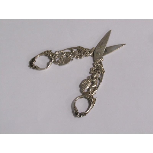 152 - A 19c German pair of silver scissors, cast with barrel makers, .800std, 12cm l.