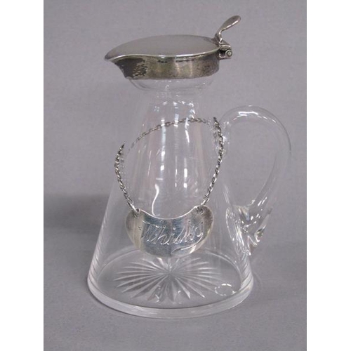 157 - An Edwardian clear glass whisky water jug with silver mount and whisky bottle ticket, makers mark fo... 