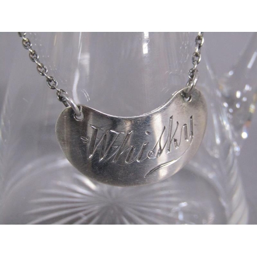 157 - An Edwardian clear glass whisky water jug with silver mount and whisky bottle ticket, makers mark fo... 