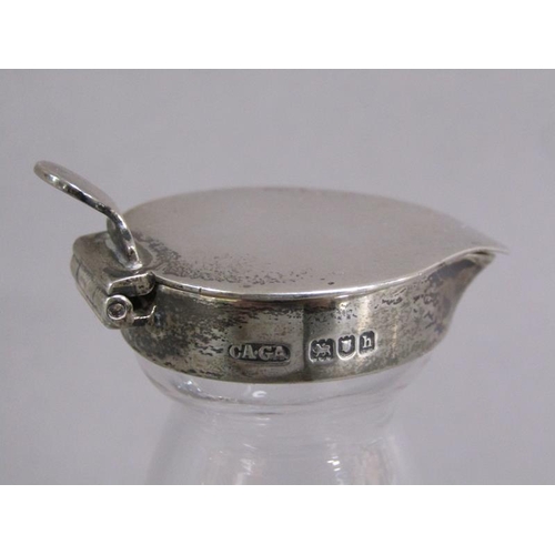 157 - An Edwardian clear glass whisky water jug with silver mount and whisky bottle ticket, makers mark fo... 