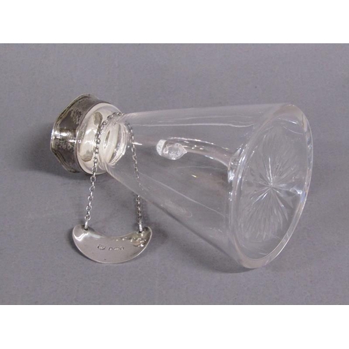 157 - An Edwardian clear glass whisky water jug with silver mount and whisky bottle ticket, makers mark fo... 