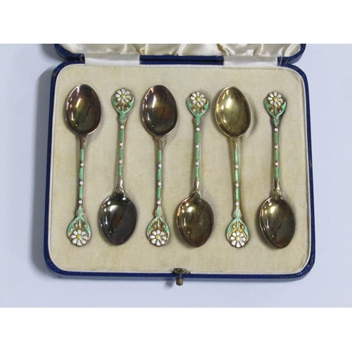 166 - A boxed set of six Mappin & Webb silver gilt coffee spoons with green and white enamelled handles an... 