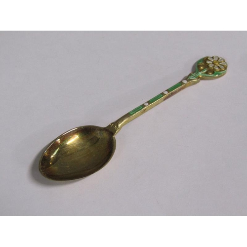 166 - A boxed set of six Mappin & Webb silver gilt coffee spoons with green and white enamelled handles an... 