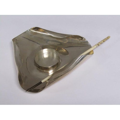 170 - An Art Deco silver single bottle inkstand, the globular cut glass bottle with silver mount and hinge... 