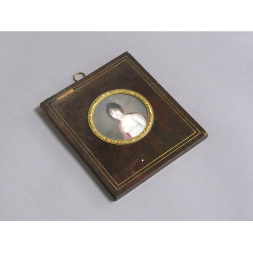 85 - Unsigned - A mid 19c portrait of a lady, circular framed and glazed, 7cm diam.