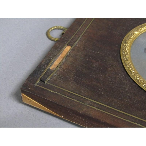 85 - Unsigned - A mid 19c portrait of a lady, circular framed and glazed, 7cm diam.