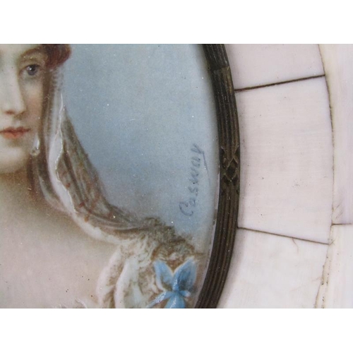 86 - Cosway - Oval framed portrait of a lady, she with roses in her hair, signed, framed and glazed, 8cm ... 