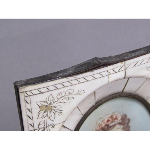 86 - Cosway - Oval framed portrait of a lady, she with roses in her hair, signed, framed and glazed, 8cm ... 