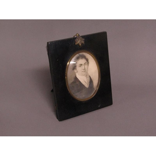 92 - A 19c framed oval portrait miniature of a gentleman, black chalk, framed and glazed, 10cm x 7cm.
