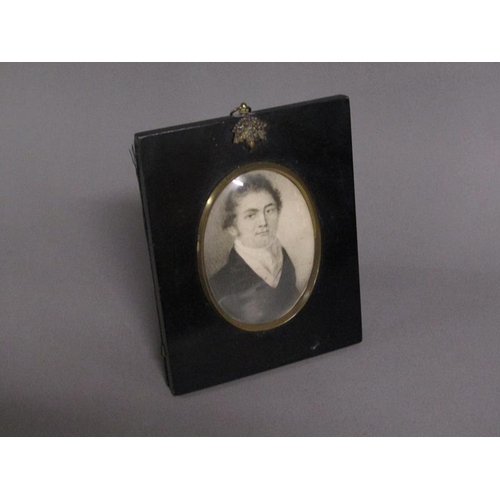 92 - A 19c framed oval portrait miniature of a gentleman, black chalk, framed and glazed, 10cm x 7cm.
