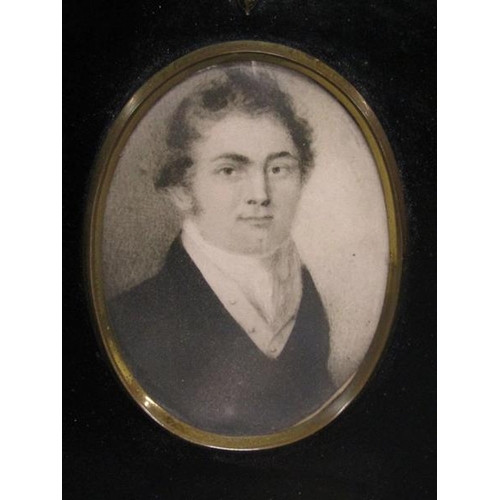 92 - A 19c framed oval portrait miniature of a gentleman, black chalk, framed and glazed, 10cm x 7cm.