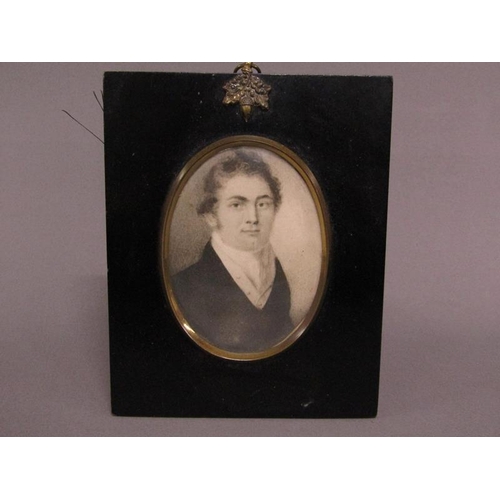 92 - A 19c framed oval portrait miniature of a gentleman, black chalk, framed and glazed, 10cm x 7cm.