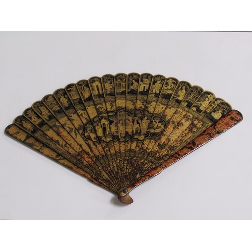 62 - A Japanese Meiji period tortoiseshell fan, chinoiserie decorated with figures, buildings and foliate... 