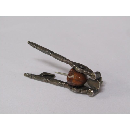 65 - A pair of Victorian miniature steel nut crack brooch, registration number for 1885, 4.5cm l.
