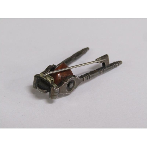 65 - A pair of Victorian miniature steel nut crack brooch, registration number for 1885, 4.5cm l.