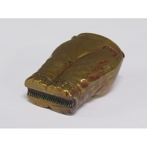 66 - A late Victorian/Edwardian brass vesta case in the form of a pair of ladies britches, 4cm h.