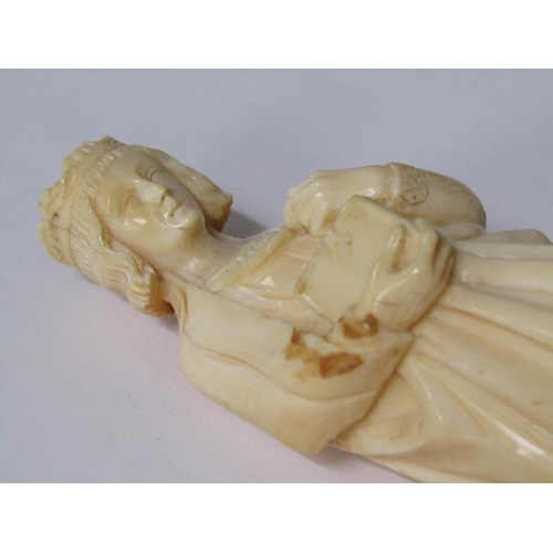 68 - A 19c European carved ivory figure of a standing female with crown, cloaked and holding a book in he... 