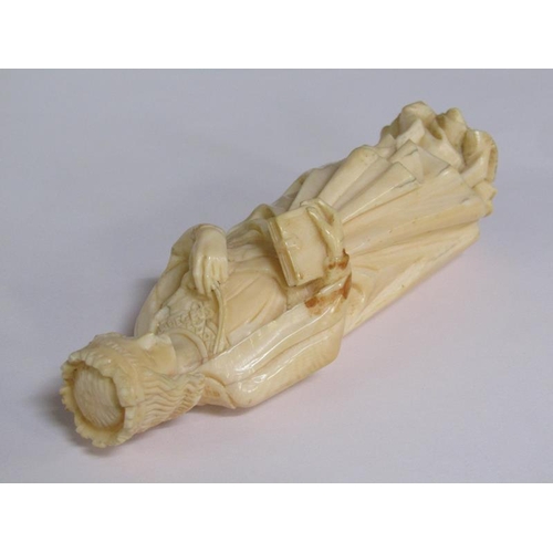 68 - A 19c European carved ivory figure of a standing female with crown, cloaked and holding a book in he... 