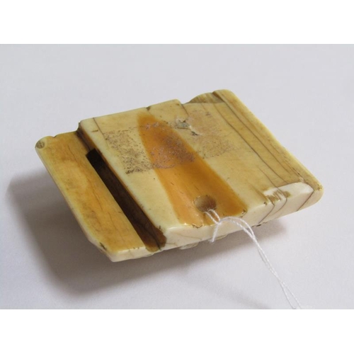 71 - An early 17c Ming type ivory belt buckle, dragon and pearl carved, 4cm x 5cm.