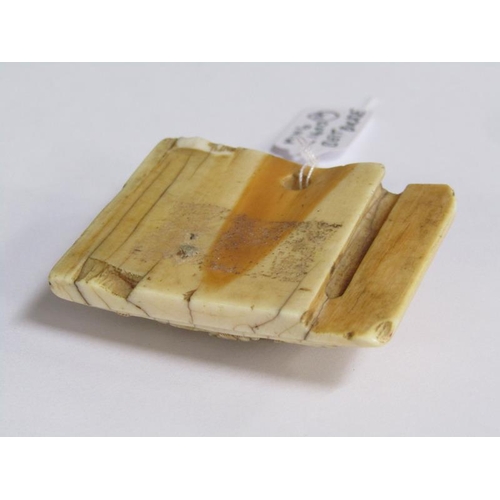 71 - An early 17c Ming type ivory belt buckle, dragon and pearl carved, 4cm x 5cm.