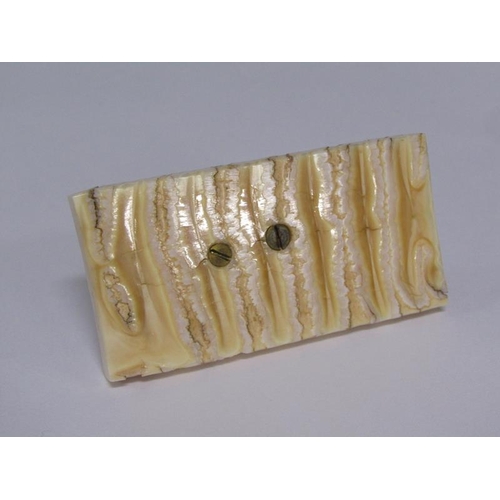 72 - A 19c carved ivory elephant supported on a carved mammoth tooth, 8cm x 4cm.