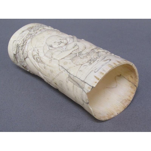 73 - A pair of Japanese ivory vases carved with a scene of Shoulao seated and with children and attendant... 