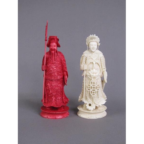 74 - Two Cantonese carved ivory chess pieces, one white, the other stained red, 13cm & 15cm h.