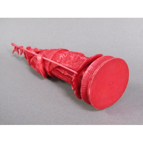 74 - Two Cantonese carved ivory chess pieces, one white, the other stained red, 13cm & 15cm h.