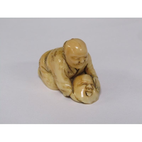 76 - A Japanese Meiji period carved ivory netsuke depicting a mask maker, 4cm w, base signed.