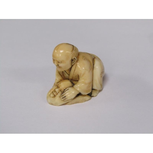 76 - A Japanese Meiji period carved ivory netsuke depicting a mask maker, 4cm w, base signed.