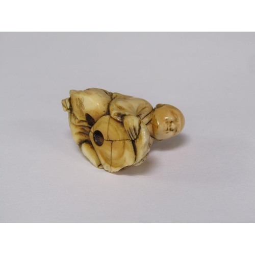 76 - A Japanese Meiji period carved ivory netsuke depicting a mask maker, 4cm w, base signed.