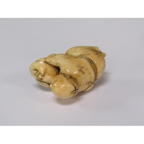 76 - A Japanese Meiji period carved ivory netsuke depicting a mask maker, 4cm w, base signed.