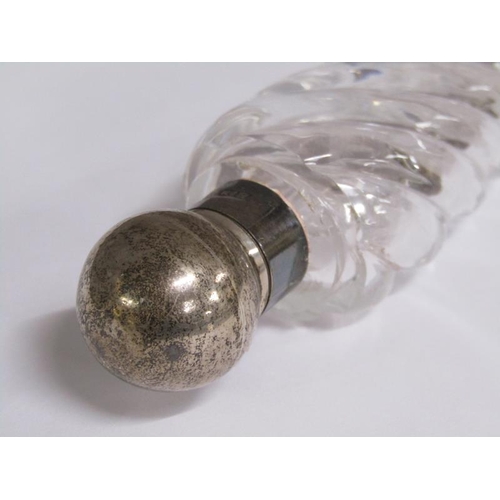 80 - A Victorian clear glass writhen moulded tapering scent bottle with silver collar and hinge dome cove... 