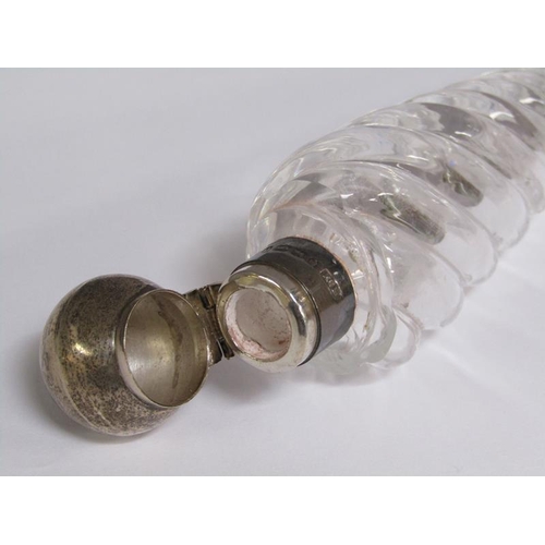 80 - A Victorian clear glass writhen moulded tapering scent bottle with silver collar and hinge dome cove... 