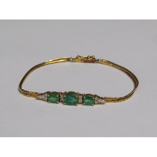 143 - An 18ct gold emerald and diamond set bracelet.
