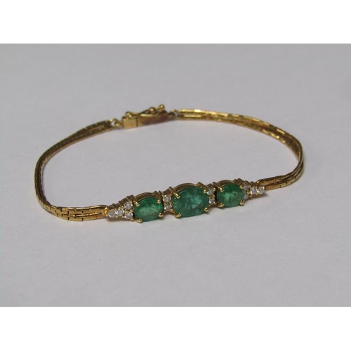 143 - An 18ct gold emerald and diamond set bracelet.