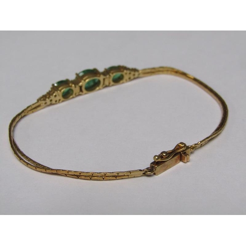 143 - An 18ct gold emerald and diamond set bracelet.
