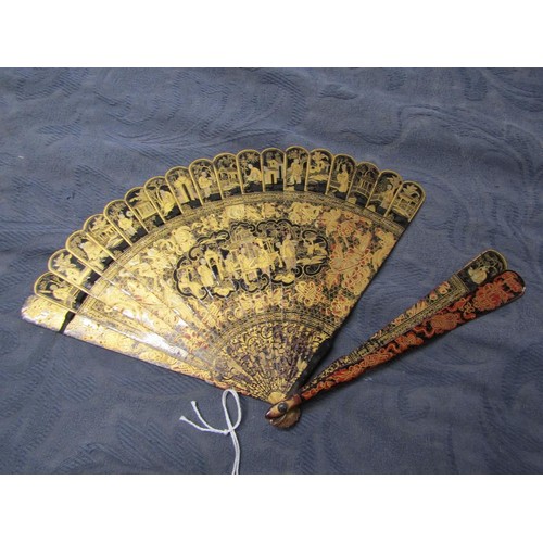 62 - A Japanese Meiji period tortoiseshell fan, chinoiserie decorated with figures, buildings and foliate... 